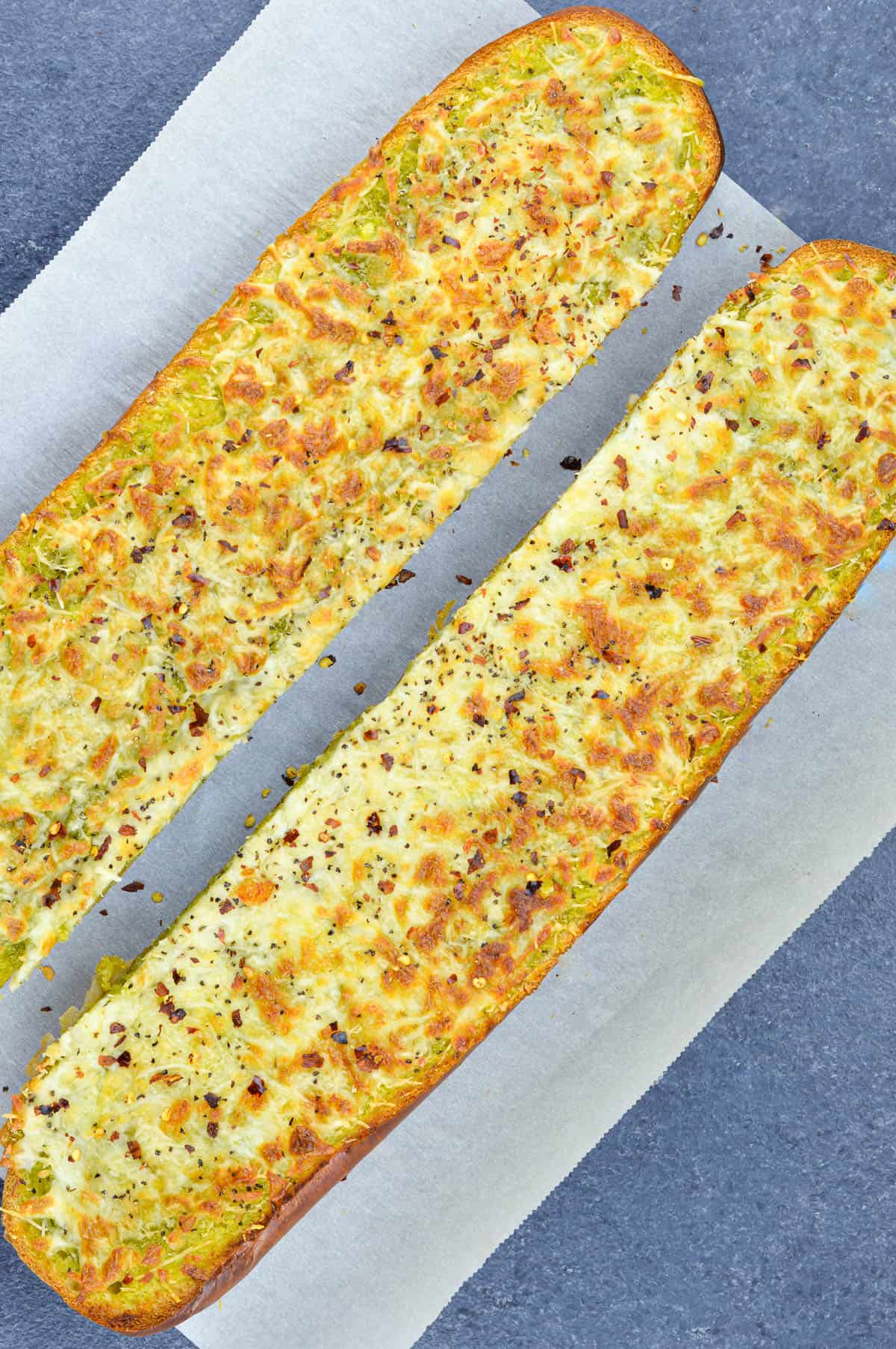 2 long loaves of garlic bread placed face up