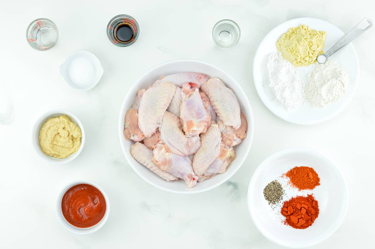 top shot of all the ingredients required to make indian style fried chicken wings
