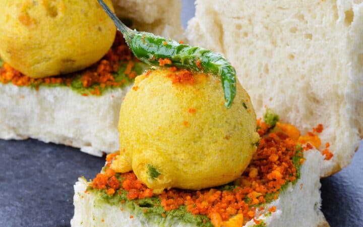 close up shot of two mumbai style vada pav.