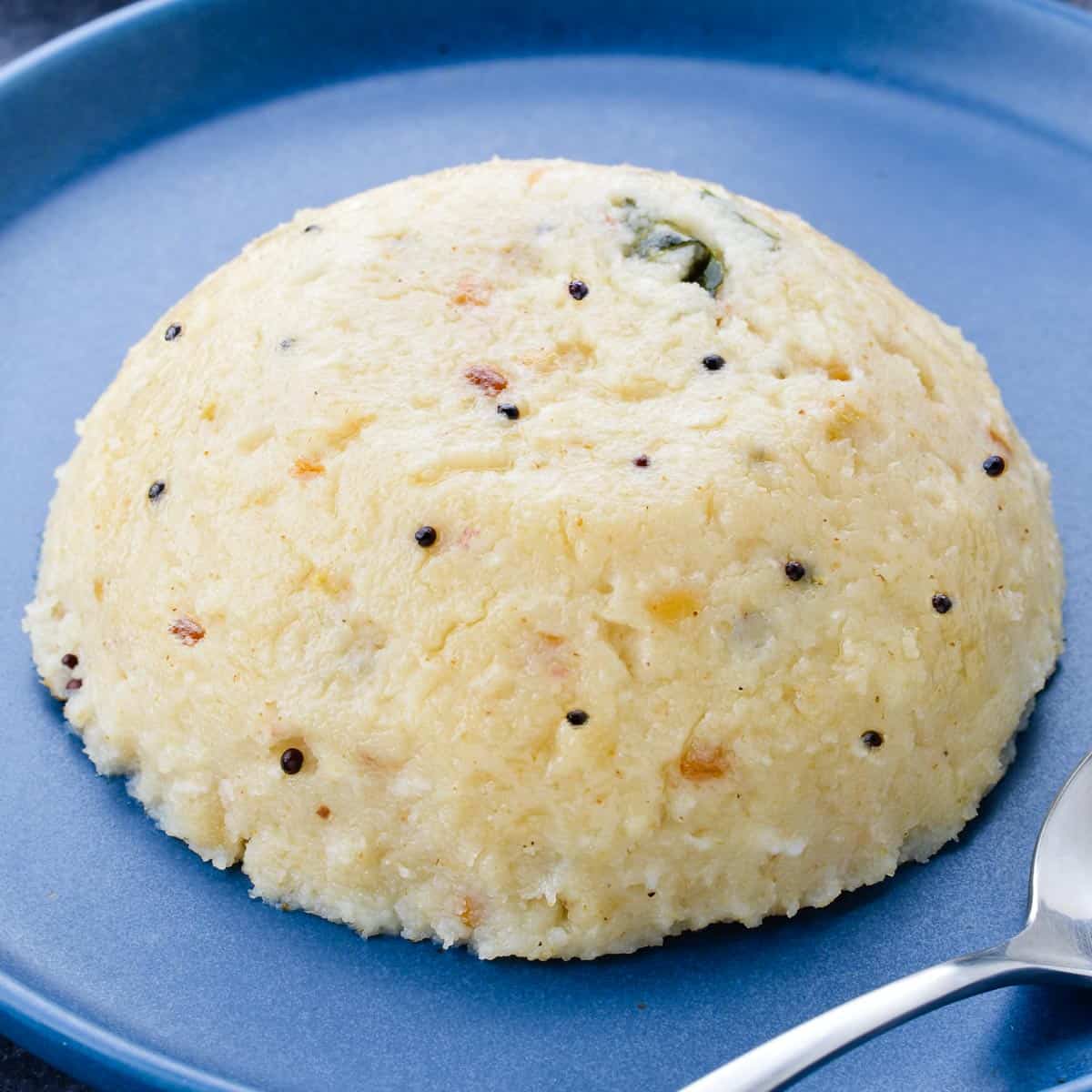 soft rava upma served in a plate.